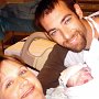 Happy Mom & Dad!<br /><br />Carey & Clint holding Willow in the delivery room.<br /><br />