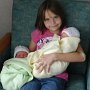 Jordan and new Brother & Sister!<br /><br />Jordan loves the babies and is a very good big sister!<br /><br />                      